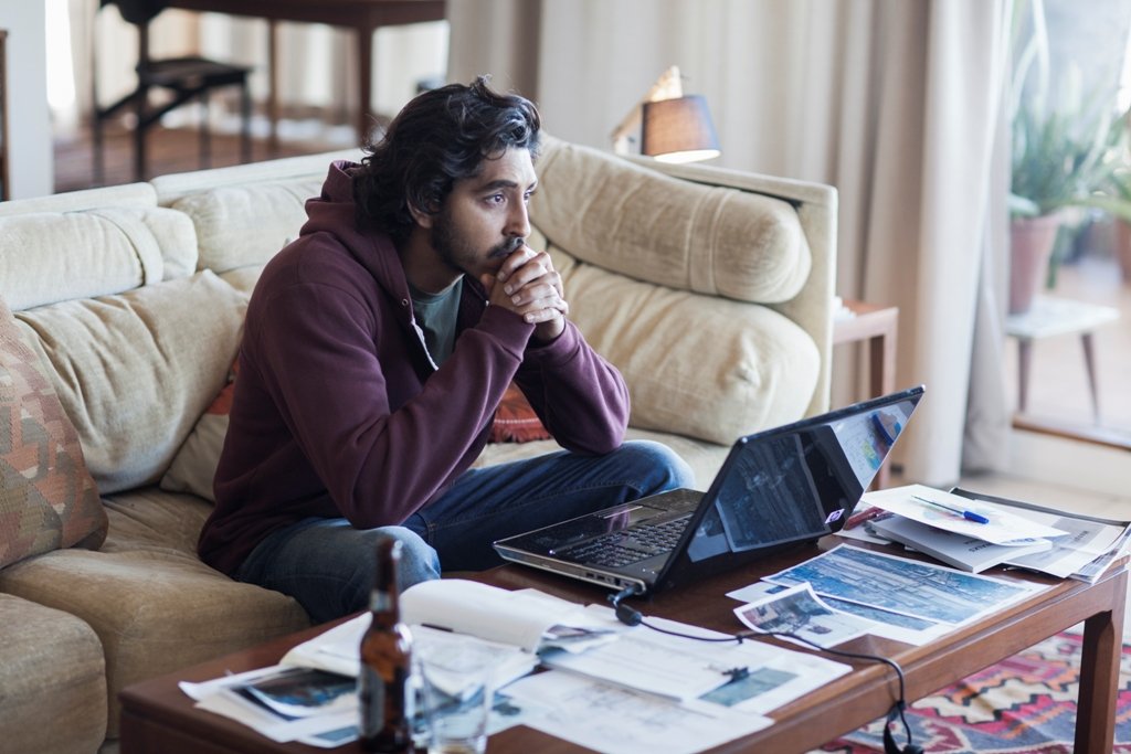 Dev Patel as Saroo Brierley in Lion (2016), searching for his birth family