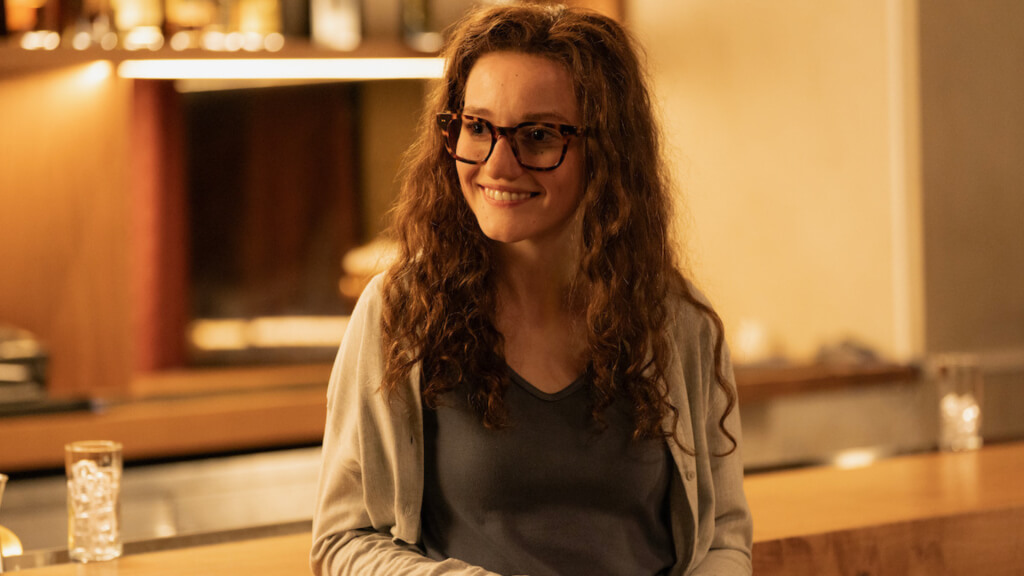 Julia Garner in character as Caroline Ellison in a first-look image from Netflix's The Altruists